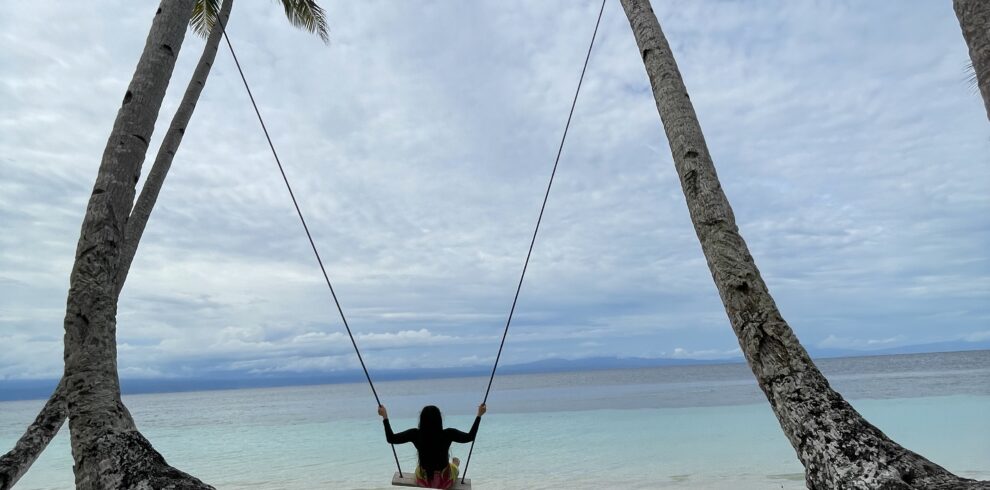 swing by coconut trees at the beach of Banggai